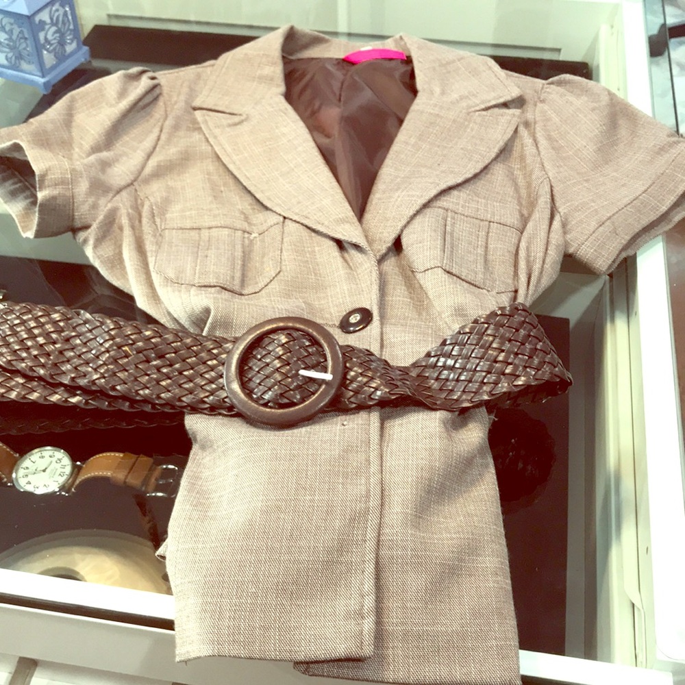 Brown blouse with matching belt.